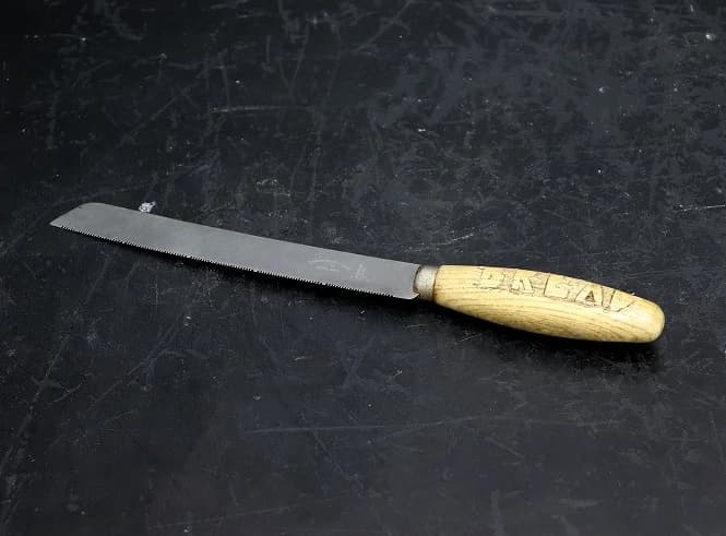 ブレッドナイフ|ステンレス・木柄・1980年代 波刃の30cm
